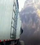 Truck Hanging Down Cliff