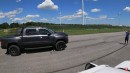 Roush Ford F-150 drags and rolls 2021 Ram 1500 TRX on Sam CarLegion