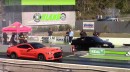 Ford Mustang GT vs. Honda Civic drag race
