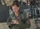 U. S. Air Force Capt. Nathan Raymond, an instructor pilot assigned to the 435th Fighter Training Squadron, removes his Oura Ring before a flight