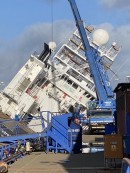 RV Petrel, once owned by Paul Allen now the property of the U.S. Navy, tipped over to its side after strong winds