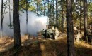 A Project Origin experimental vehicle dispenses smoke during a Soldier Touchpoint at Fort Benning, Georgia, Nov. 6, 2020