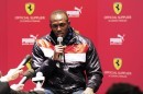 Usain Bolt talks to the media in Maranello