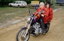 Elizabeth Taylor on her Purple Passion Harley-Davidson