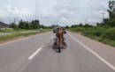 Man in full Predator suit rides an Alien-shaped bike in Thailand