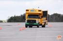 Watch a school bus take the moose test, handles it like a pro