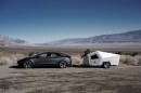 Watch a Tesla Model 3 towing a camper at 55 mph
