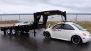Watch an Old VW Beetle TDI Pull a Gooseneck Trailer With Its Roof