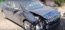 Watch How a Russian Mechanic Repairs a Toyota Prius Wreck