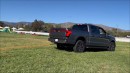 Rivian R1T drags Ford F-150 Lightning in a tug of war