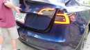 Current Tesla Model 3 sports split taillights