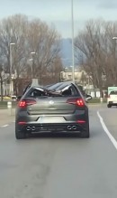 Volkswagen Golf R drives with a crushed roof