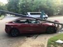 Tesla Model 3 resisted a falling concrete pole