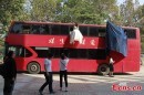 Wedded Couple Levitating off the Side of a Double-Decker Steals the Show in China