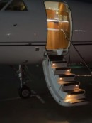Rick Ross on Falcon 900 Plane