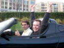 JB Straubel and Elon Musk in the original Tesla Roadster