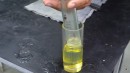 Does gasoline work better than water as spark fluid?
