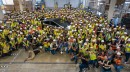 The hand signal that the Tesla workers are flashing