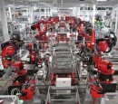 Robots working in a Tesla factory