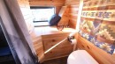Wheelchair-Accessible Skoolie Boasts a Rustic Cabin Interior and a Practical Open Layout