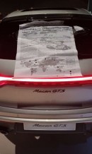 Scientific Papers Glued on a Porsche Macan GTS