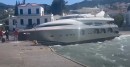 Motor yacht Why is pushed by wind onto beach and into a stone pier