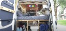 Beautiful camper van features a rustic-modern interior filled with amenities