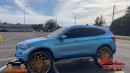 BMW X1 riding on Brushed Gold Rucci Forged 30-inch wheels on Superior Shelbie & Ace Whips