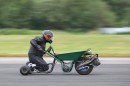Dylan Phillips' DIY motorized wheelbarrow is officially the world's fastest, with an average run of 53 mph