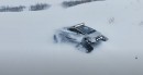 Tesla Cybertruck on tracks plays in the snow