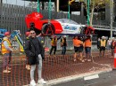 Australian millionaire causes outrage by taking a $3M race car by crane up to his $39M penthouse