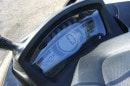 Yamaha Tricity  has a nice, easily-readable LCD dashboard