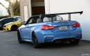 Yas Marina Blue BMW M4 with Trunk Wing