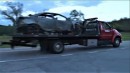 burned car on tow truck fox