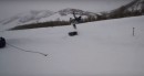 Lamborghini pulling a human snowboard