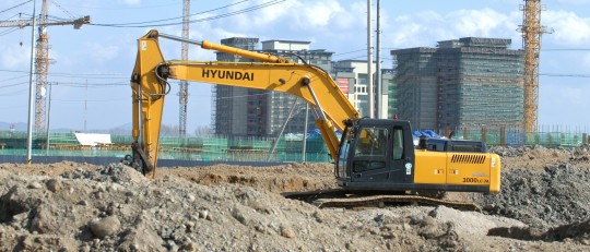 A modern Hyundai excavator at work