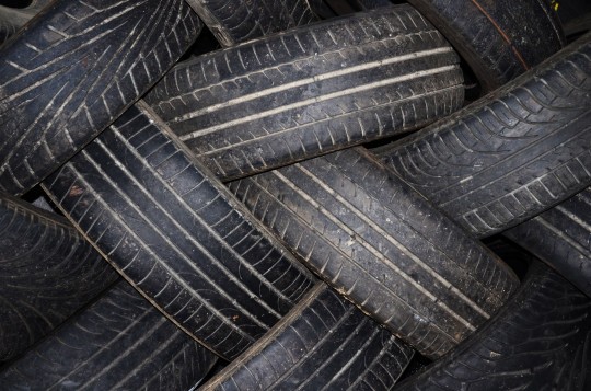 A stack of used tires before recycling
