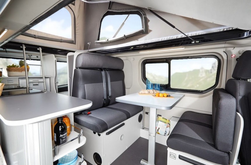 The 2022 Van Big City campervan includes full kitchen and tiny bathroom, sleeping for four