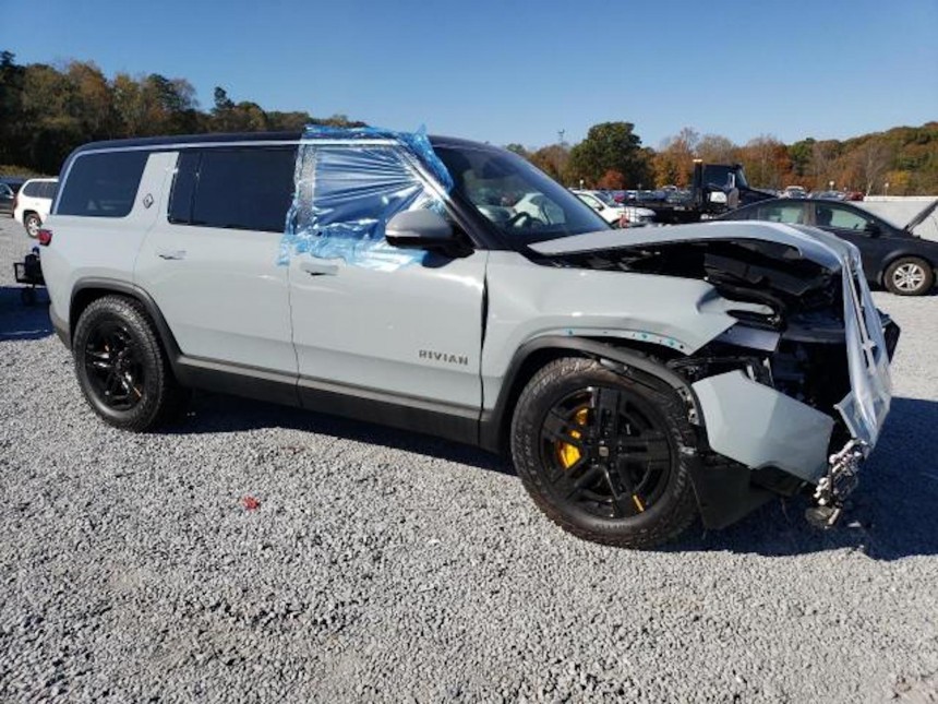 2023 Rivian R1S has a face covered in bandages