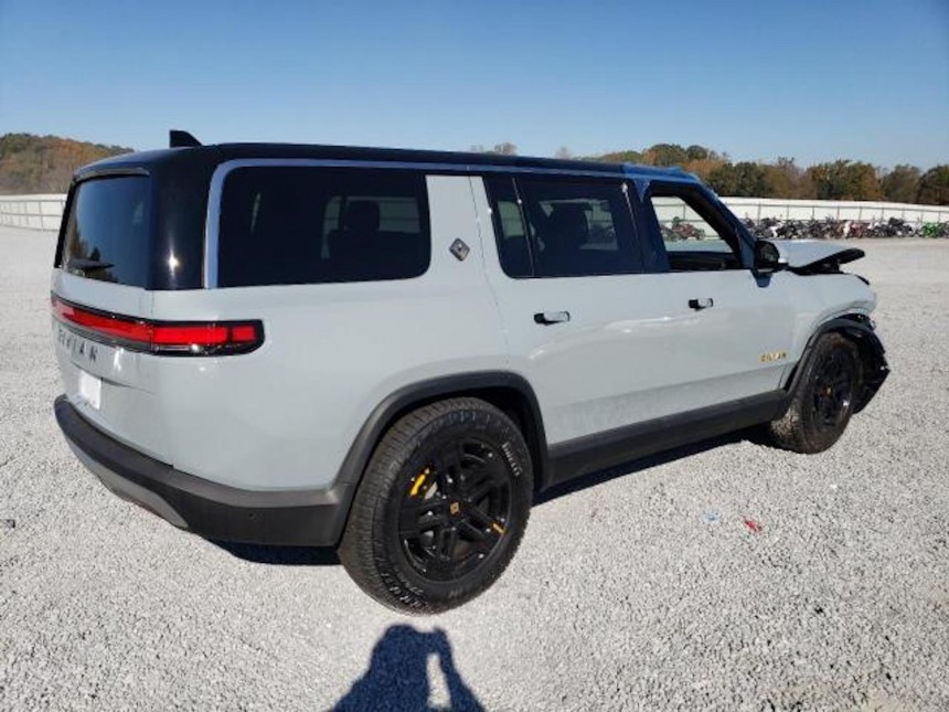 2023 Rivian R1S has a face covered in bandages