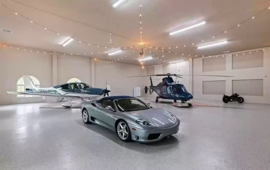 Mansion located in Florida aviation community comes with 2 private hangars, garage, and resort\-like amenities