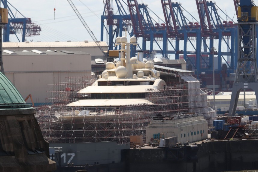 Megayacht Dilbar at the Blohm \+ Voss shipyard in Germany, undergoing construction work after it was seized by authorities