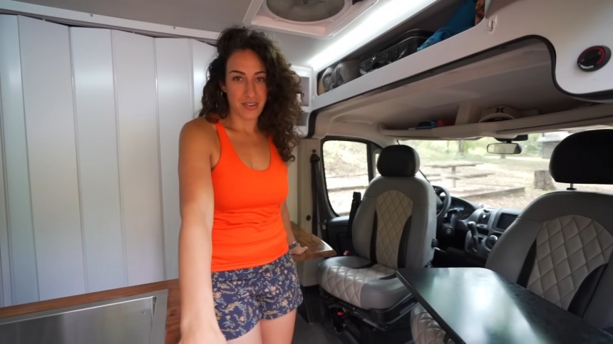 Off\-Grid Camper Van Conversion Breaks the Mould With a Cozy "Burrito Bed"