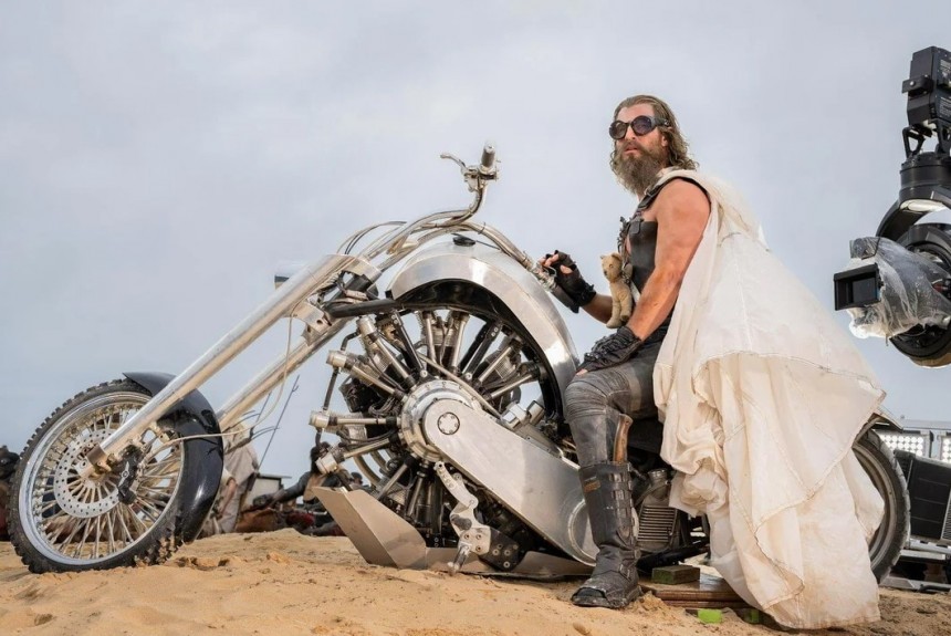 Chris Hemsworth as Dementus, on a modified JRL Lucky 7 radial\-engined motorcycle