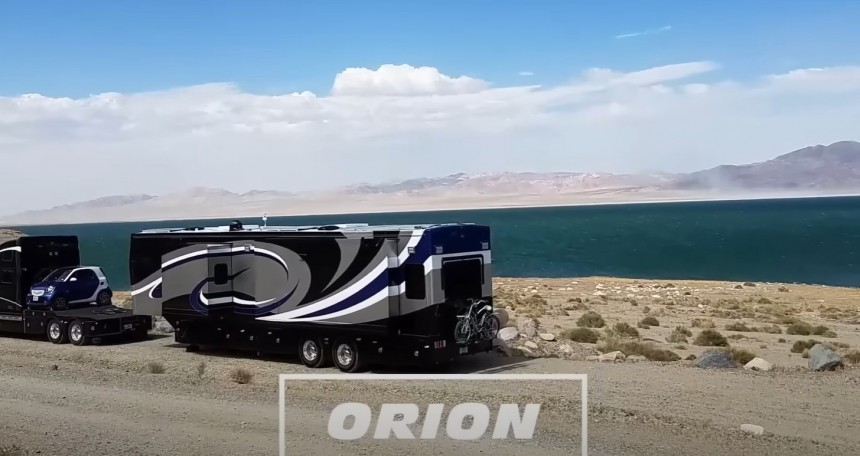 Custom rig with a Volvo semi\-tractor and a fifth\-wheel on a semi\-trailer, dubbed Orion