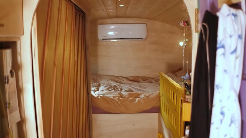 Cute and Cozy School Bus Conversion Serves as a Full\-Time Home for a Couple and Their Baby