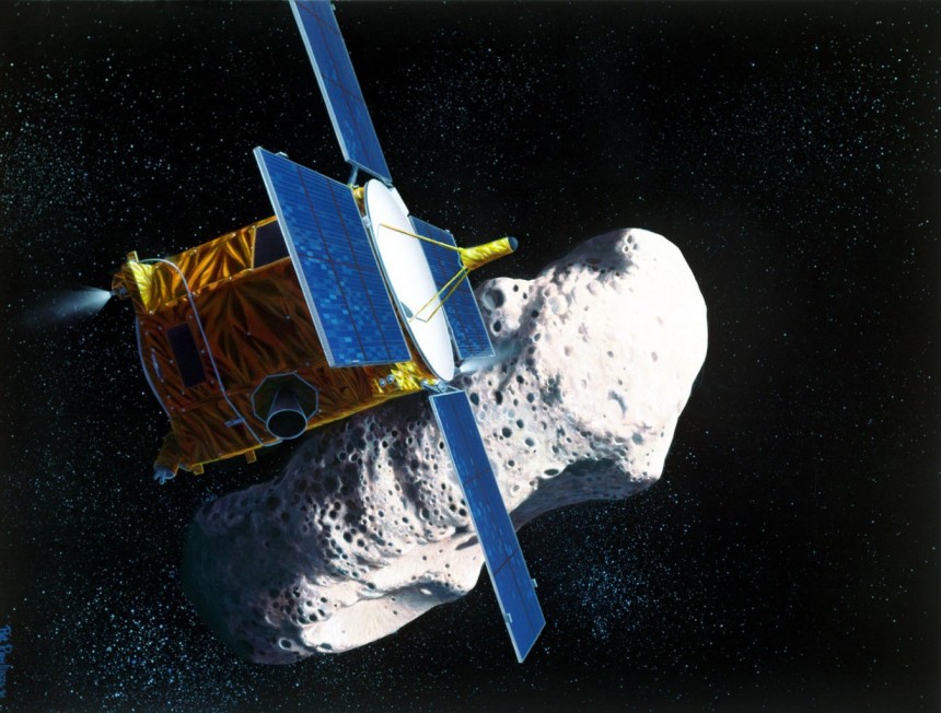 An artist's rendering of NASA's Near Earth Asteroid Rendezvous \(NEAR\) spacecraft at asteroid Eros