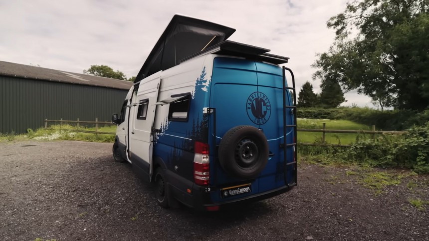 Deluxe Sprinter Camper Van Breaks the Norm With a Staircase Leading to a Cozy Pop\-Top Roof