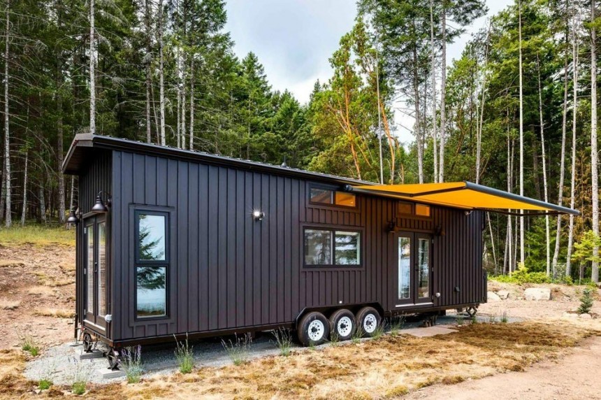 This tiny uses dual slide\-outs to create a real home\-like space, but on wheels