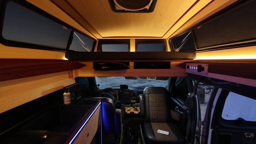 Exquisite Off\-Road Camper Van Features an Exotic Wood Interior and a Panoramic Loft Bed